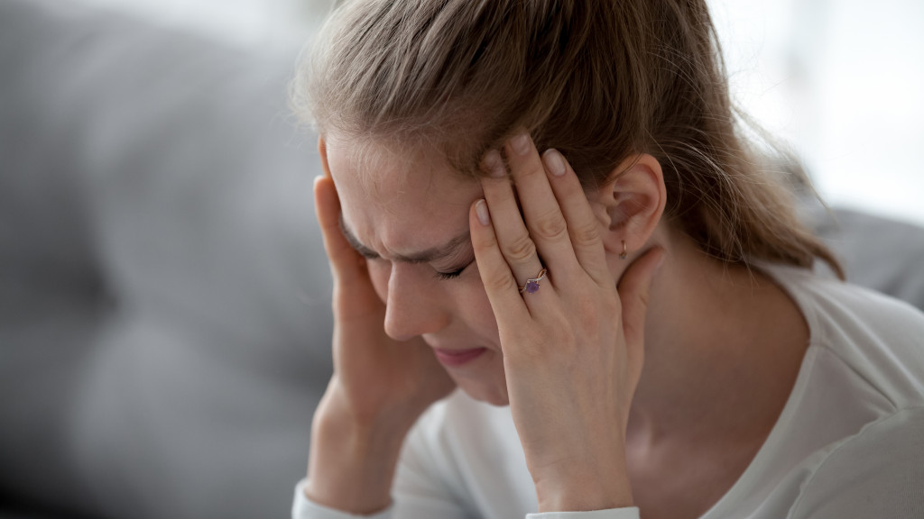 Vrouw met hoofdpijn
